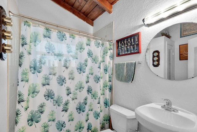 bathroom with lofted ceiling with beams, sink, toilet, wooden ceiling, and a shower with curtain