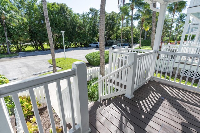 wooden terrace featuring covered porch