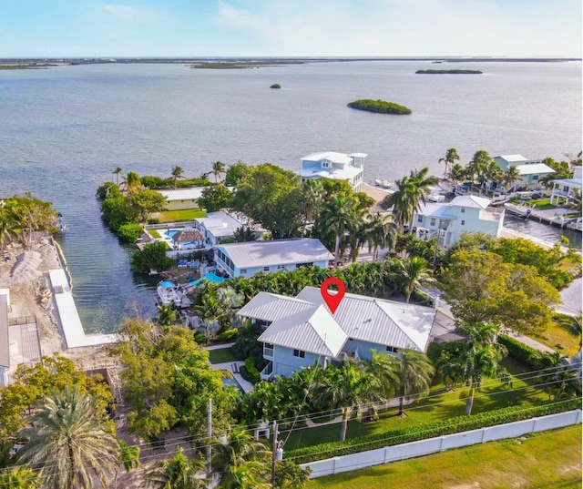 birds eye view of property featuring a water view