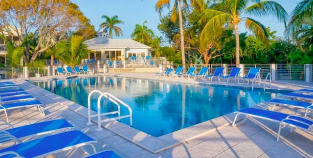 view of swimming pool with a patio