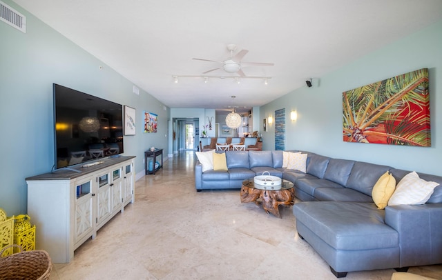 living room with track lighting and ceiling fan