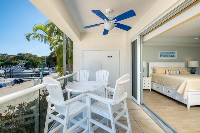 balcony featuring ceiling fan