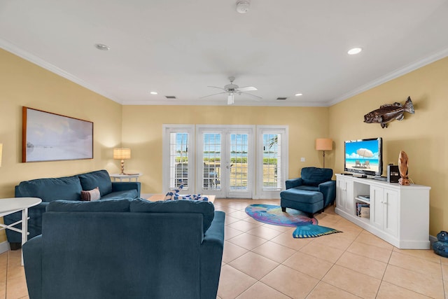 tiled living room featuring crown molding, french doors, and ceiling fan