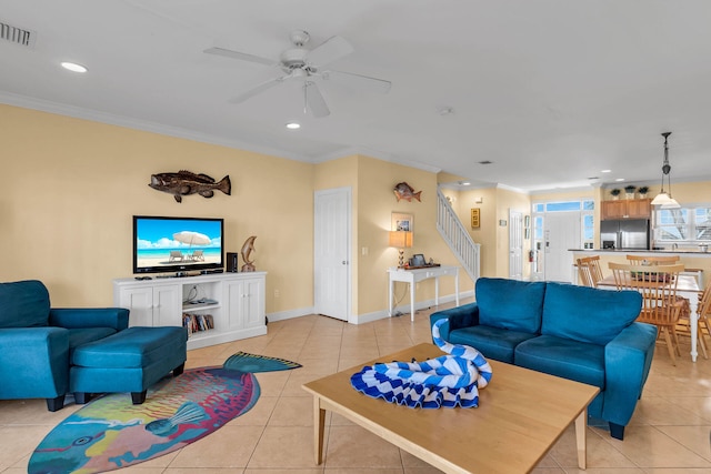 tiled living room featuring crown molding and ceiling fan