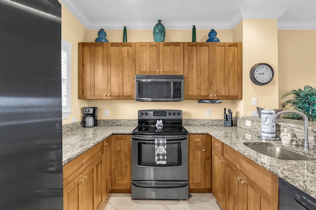 kitchen with sink, crown molding, light tile patterned floors, stainless steel appliances, and light stone countertops