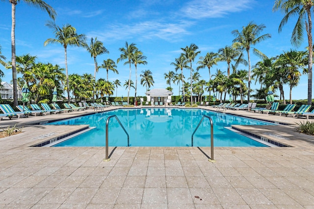 view of swimming pool with a patio