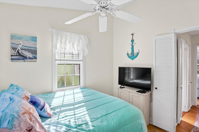 bedroom featuring light hardwood / wood-style flooring and ceiling fan