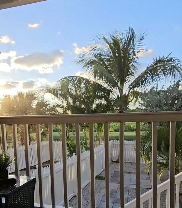 view of balcony at dusk