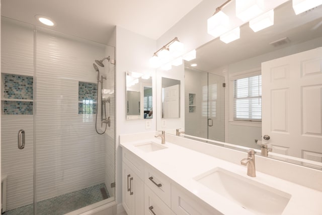 223 Golf Club Dr, Key West, FL 33040 - full bathroom featuring double vanity, a sink, a stall shower, and visible vents