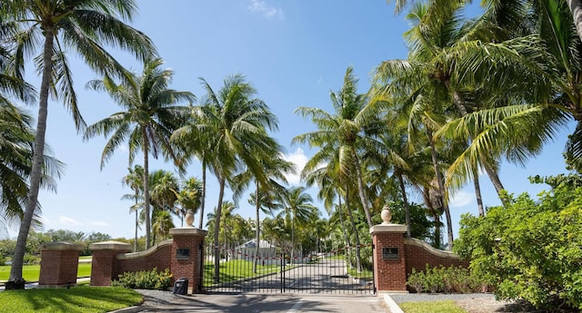 223 Golf Club Dr, Key West, FL 33040 - view of gate featuring fence and a yard