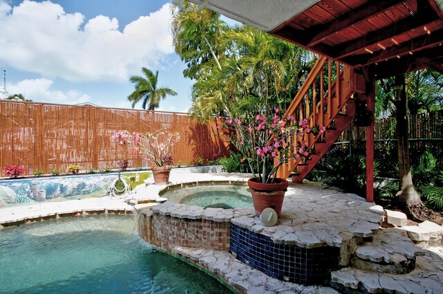 view of pool featuring a fenced in pool and a fenced backyard