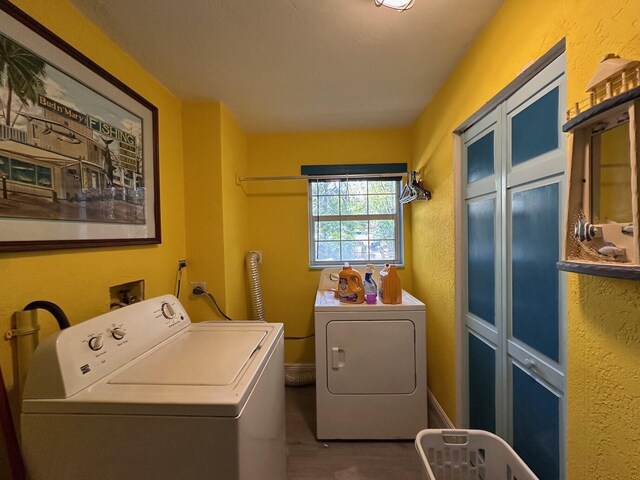 bedroom with baseboards, visible vents, ceiling fan, wood finished floors, and a wall mounted AC