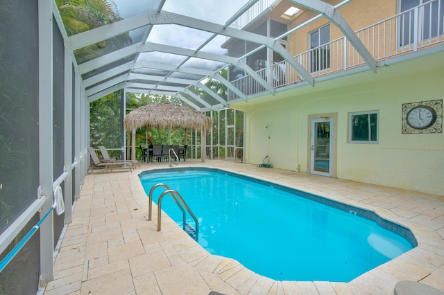 view of pool featuring a gazebo, a lanai, and a patio area