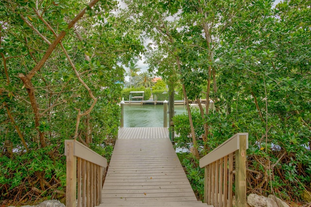 view of dock with a water view