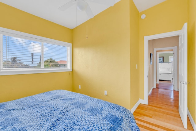 bedroom featuring ceiling fan and wood-type flooring