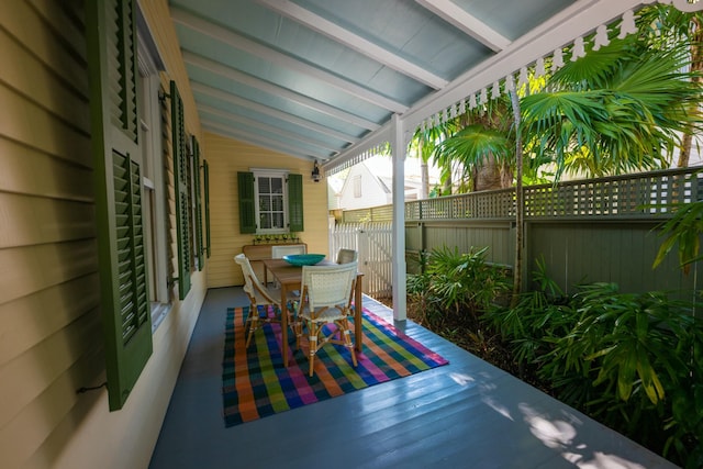 view of patio featuring a gate and fence