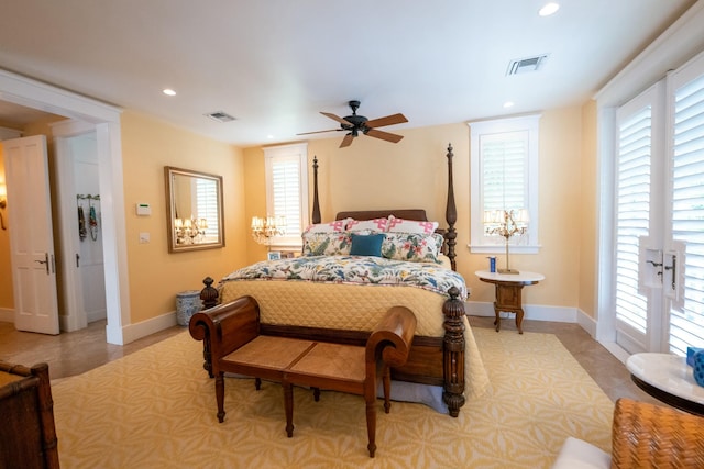 bedroom with a ceiling fan, recessed lighting, visible vents, and baseboards