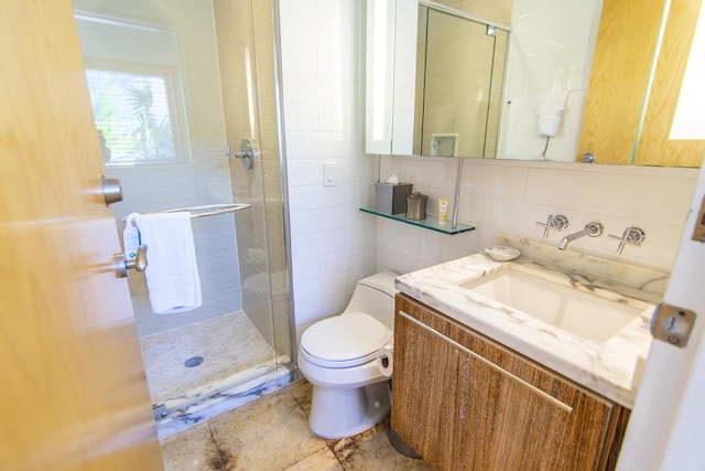 bathroom with toilet, an enclosed shower, tile walls, vanity, and backsplash