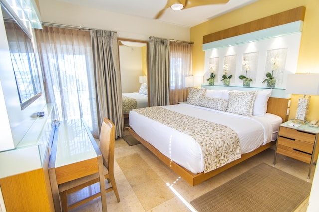 bedroom featuring ceiling fan