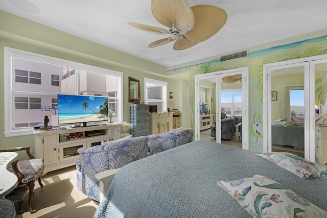 bedroom featuring visible vents and a ceiling fan