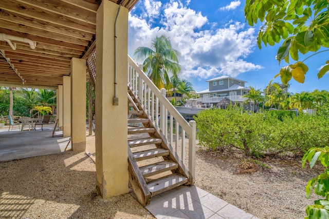 27312 Anguila Ln, Ramrod, FL 33042 - view of patio / terrace featuring stairs