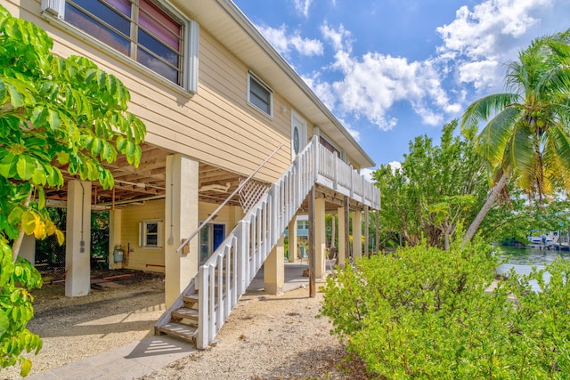 27312 Anguila Ln, Ramrod, FL 33042 - exterior space featuring stairway and a water view