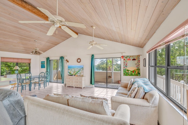 27312 Anguila Ln, Ramrod, FL 33042 - living room with tile patterned floors, lofted ceiling with beams, and a healthy amount of sunlight