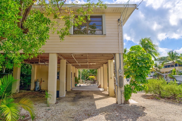 27312 Anguila Ln, Ramrod, FL 33042 - view of vehicle parking featuring a carport