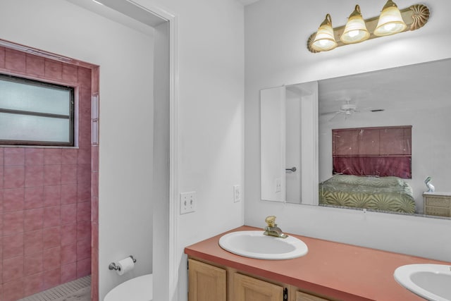 27312 Anguila Ln, Ramrod, FL 33042 - full bath with double vanity, tiled shower, toilet, and a sink