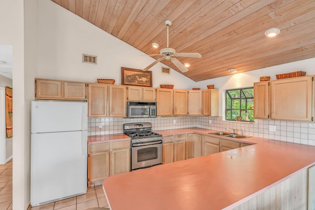 27312 Anguila Ln, Ramrod, FL 33042 - kitchen featuring light tile patterned floors, light brown cabinets, visible vents, stainless steel appliances, and light countertops
