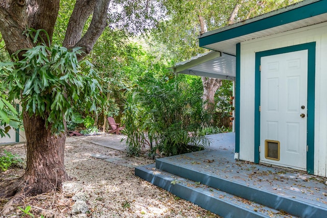 entrance to property with a deck