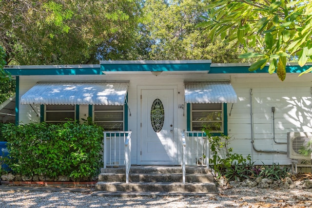 property entrance with ac unit