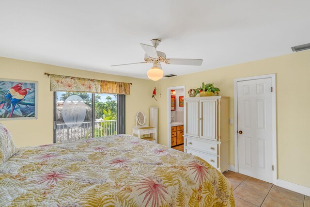 17166 W Wahoo Ln, Sugarloaf, FL 33042 - bedroom featuring access to outside, light tile patterned floors, and a ceiling fan