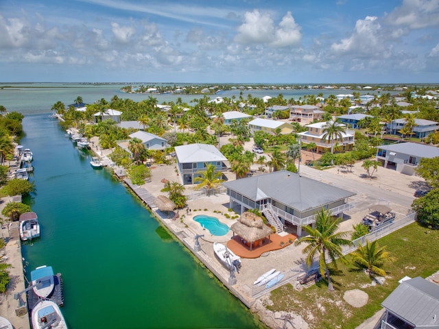 17166 W Wahoo Ln, Sugarloaf, FL 33042 - aerial perspective of suburban area with a nearby body of water and a pool