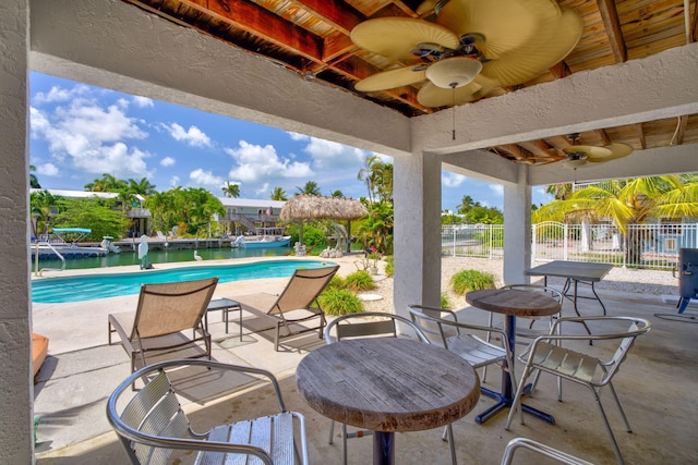 17166 W Wahoo Ln, Sugarloaf, FL 33042 - view of patio featuring ceiling fan and an outdoor pool