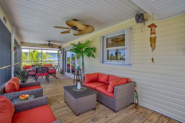17166 W Wahoo Ln, Sugarloaf, FL 33042 - wooden terrace featuring outdoor dining area, an outdoor living space, and a ceiling fan