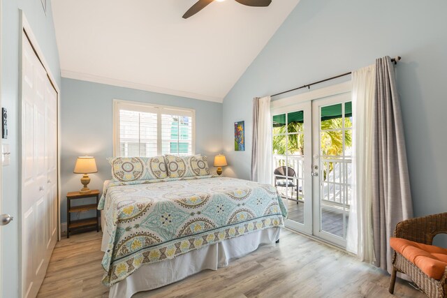 532 Porter Ln, Key West, FL 33040 - bedroom with access to outside, french doors, a closet, high vaulted ceiling, and wood finished floors