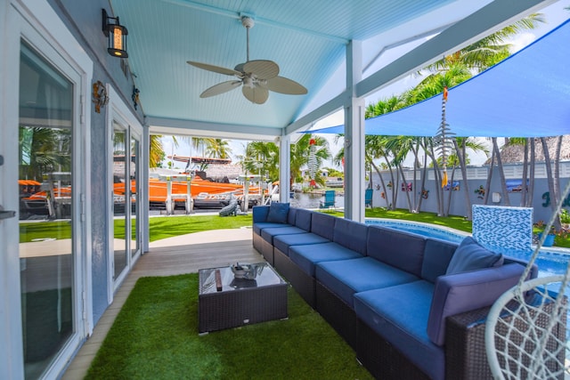 3034 Riviera Dr, Key West, FL 33040 - sunroom with a ceiling fan and an outdoor hangout area