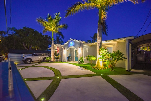 3034 Riviera Dr, Key West, FL 33040 - view of front of house featuring stucco siding