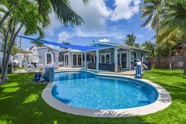 3034 Riviera Dr, Key West, FL 33040 - view of swimming pool featuring a fenced in pool, a patio, french doors, a yard, and fence