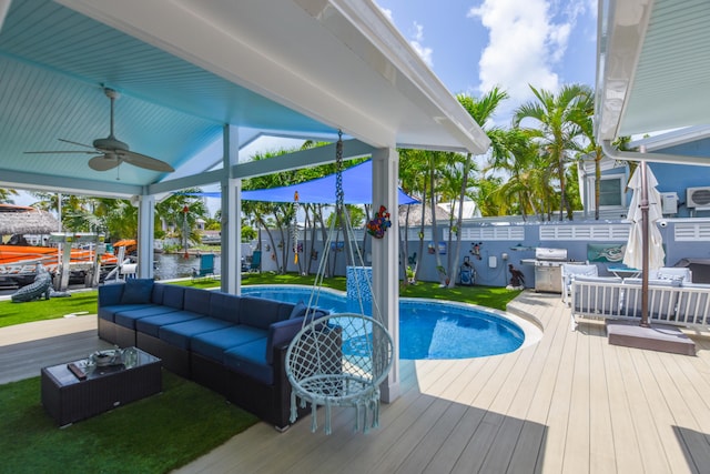 3034 Riviera Dr, Key West, FL 33040 - view of swimming pool with ceiling fan, fence, an outdoor hangout area, a wooden deck, and a fenced in pool
