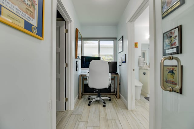 3034 Riviera Dr, Key West, FL 33040 - office with baseboards and wood finish floors