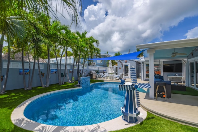3034 Riviera Dr, Key West, FL 33040 - view of swimming pool featuring a yard, a fenced backyard, a fenced in pool, and a ceiling fan