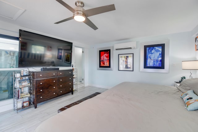 3034 Riviera Dr, Key West, FL 33040 - bedroom with ceiling fan, a wall mounted AC, wood finished floors, and baseboards