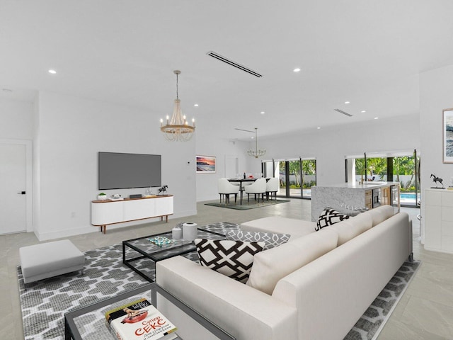 living room with a notable chandelier