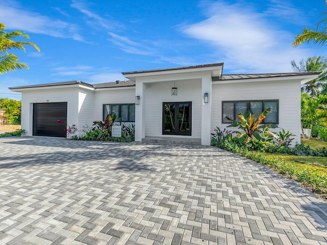 contemporary home featuring a garage