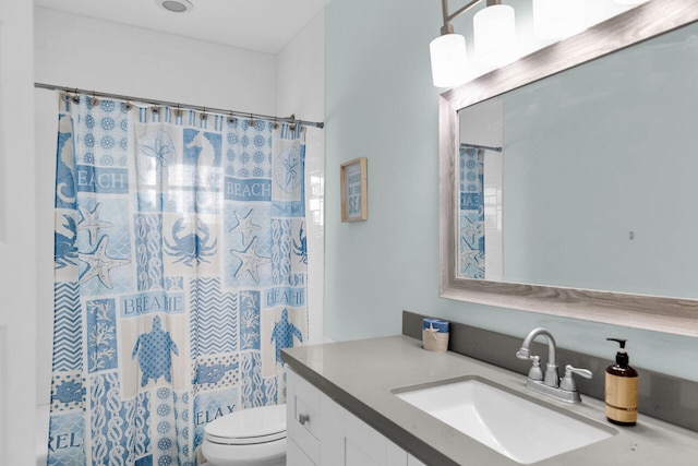 241 W Seaview Dr, Duck, FL 33050 - bathroom featuring vanity, toilet, and a shower with shower curtain