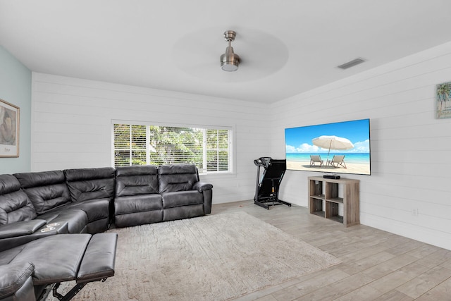 241 W Seaview Dr, Duck, FL 33050 - living area featuring a ceiling fan, wood finished floors, and wooden walls