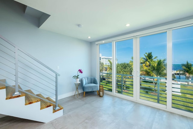 94825 Overseas Hwy Unit 204, Key Largo, FL 33037 - living area with stairs and recessed lighting