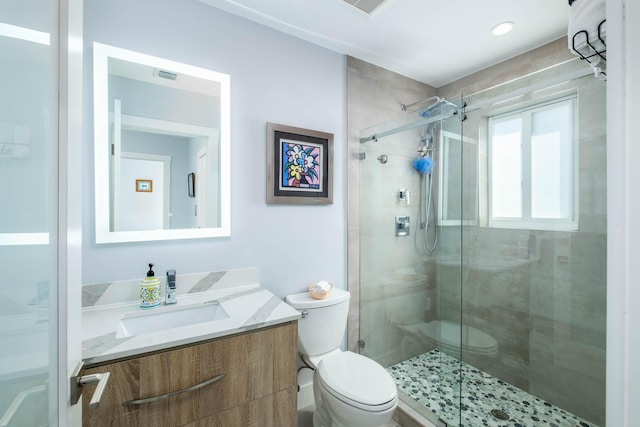 94825 Overseas Hwy Unit 204, Key Largo, FL 33037 - bathroom featuring a stall shower, toilet, and vanity